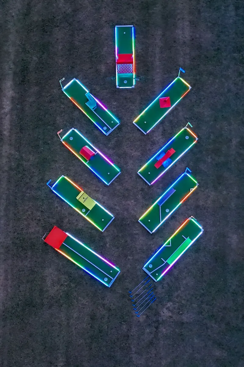 Aerial view of a 9-hole portable mini golf course at a Capital Region NY event
