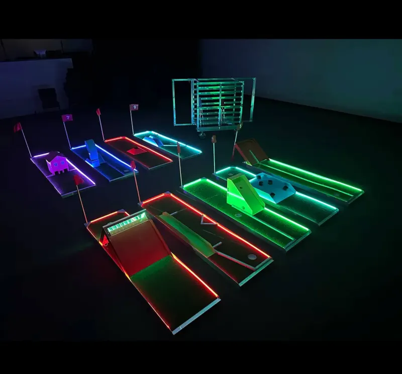 Glow-in-the-dark LED-lit portable mini golf at an evening event in Saratoga, NY