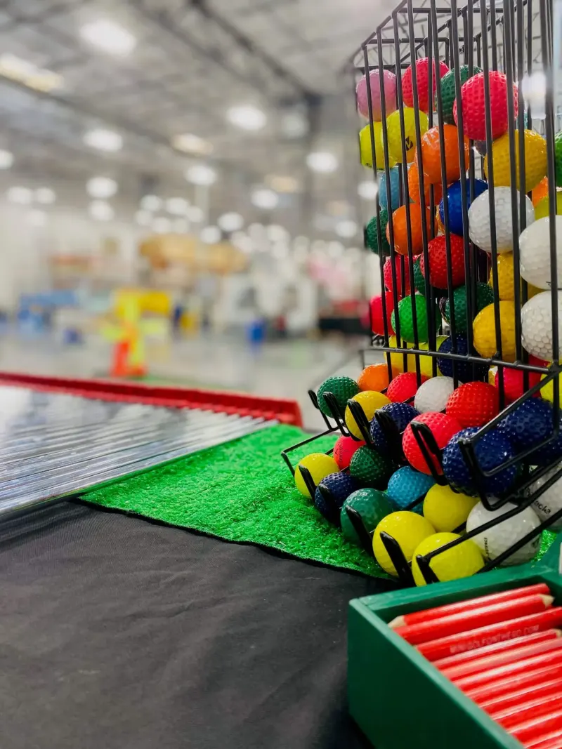 Twenty colors of golf balls included with every Gimme Greens Mini Golf Capital Region rental