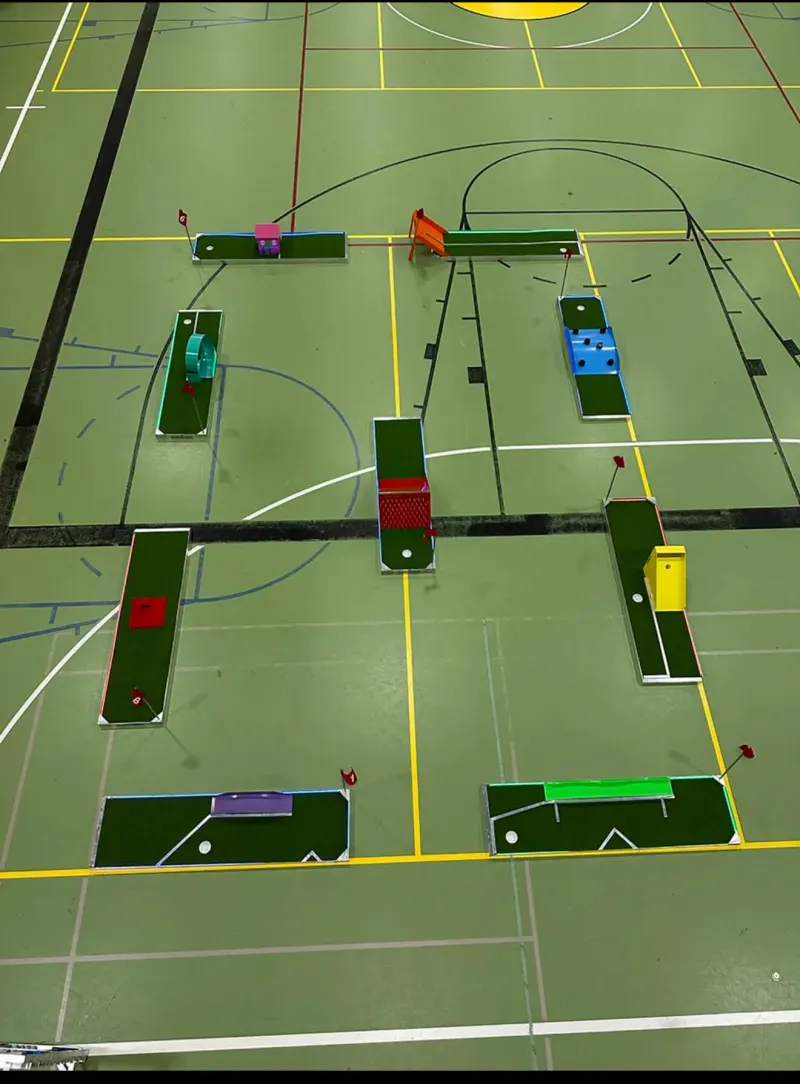 Close-up of a portable mini golf hole and obstacle in Troy, NY